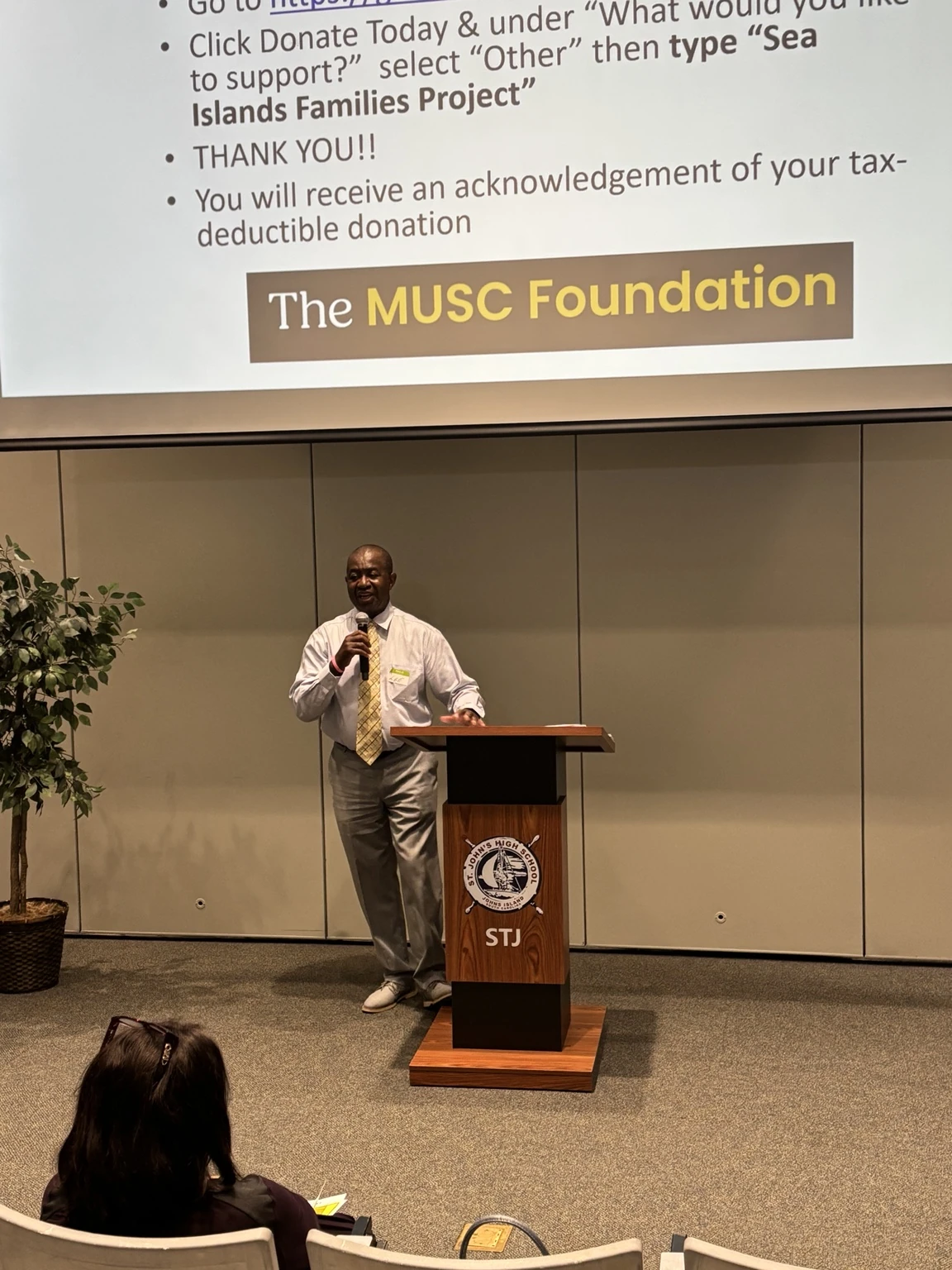 Lee H. Moultrie speaking at a community presentation